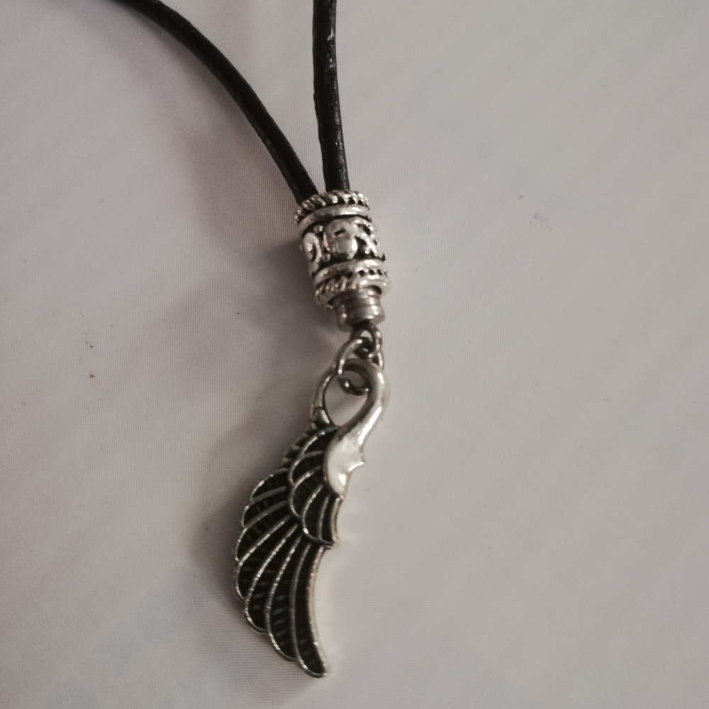 Women's leather necklace with angel's wing charm